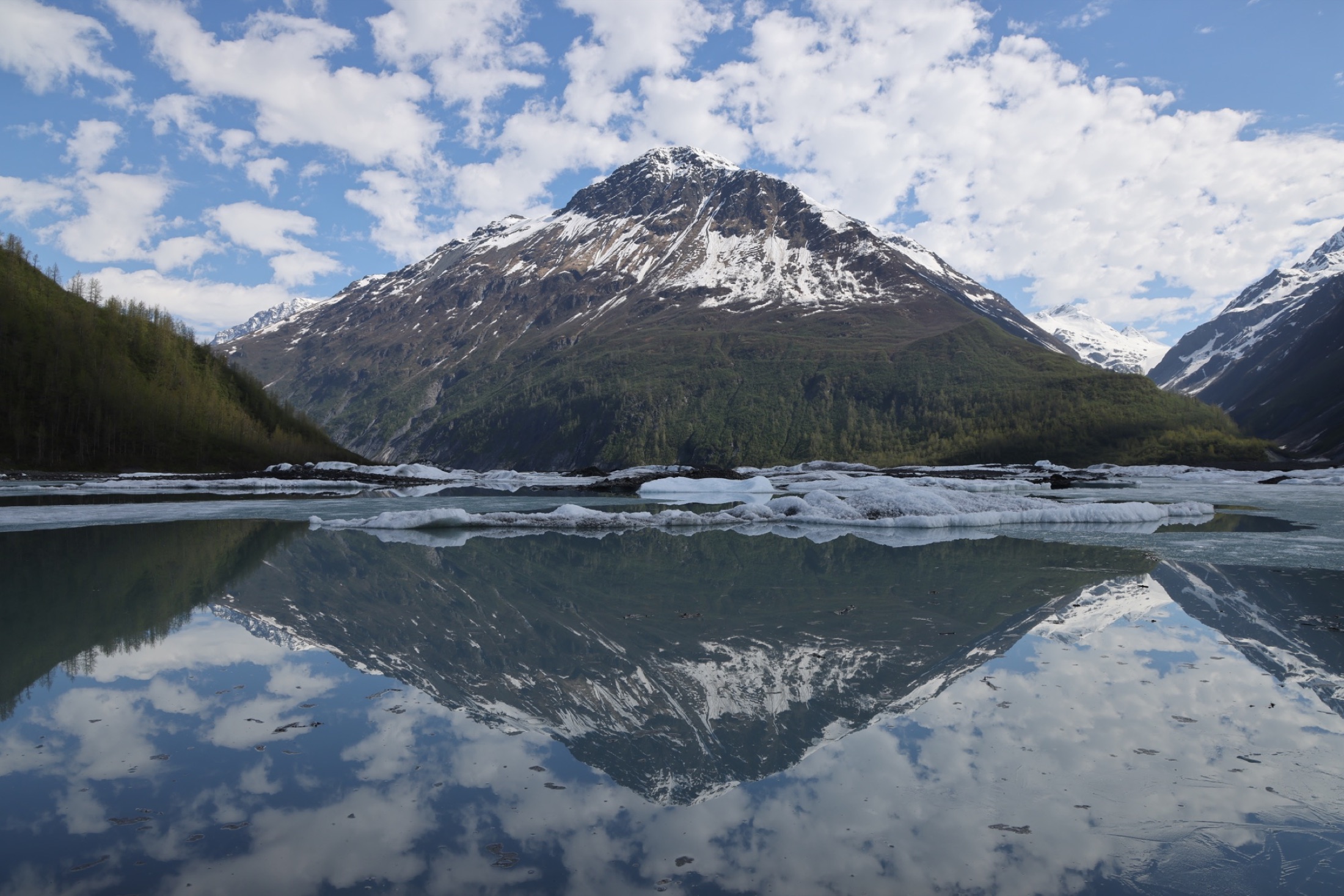Columbia Glacier and its icy blue face meeting the water